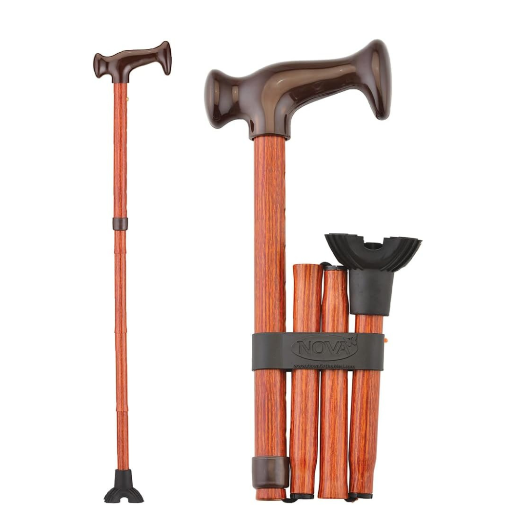 The Nova Folding Walking Cane features a wood grip handle and quad tip, shown in brown both fully extended and folded into four sections with a securing strap.